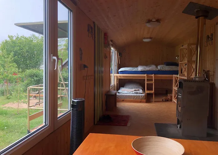 Ferienhaus Wilde Möhre Bauwagen Sommerküche Draussen Abenteuer